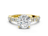 Yellow gold Round Cut Diamond Side Stone Solitaire Ring with Round with Moissanite side stone and Four-Prong Setting