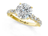 Yellow gold Round Cut Diamond Side Stone Solitaire Ring with Round with Moissanite side stone and Four-Prong Setting_1