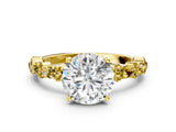 Yellow gold Round Cut Diamond Side Stone Solitaire Ring with Round with Yellow Sapphire side stone and Four-Prong Setting