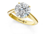 Yellow gold Round Cut Diamond Solitaire Engagement Ring with Cathedral Setting and Four-Prong Mount_88