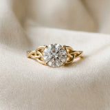 Yellow gold Round Cut Diamond Solitaire Engagement Ring with Celtic Knot Band and Four-Prong Setting_87