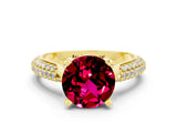 Yellow gold Round Cut Diamond Solitaire Engagement Ring with Pavé Band and Four-Prong Setting