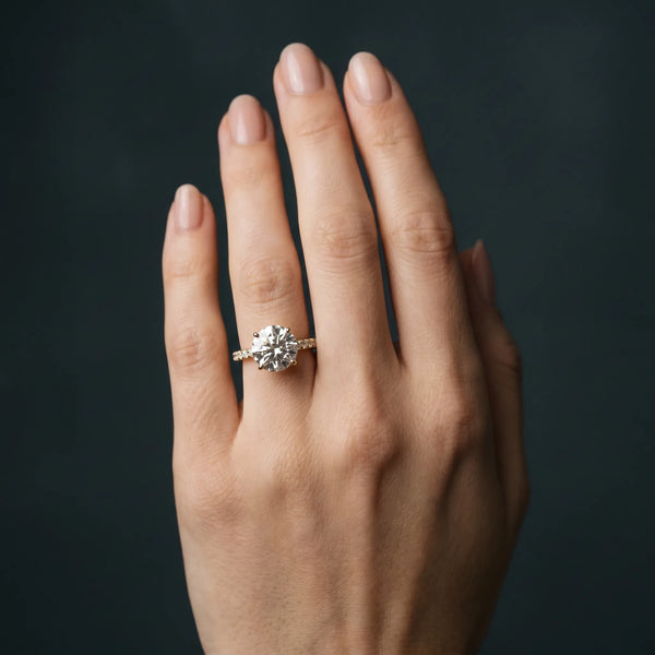 Yellow gold Round Cut Diamond Solitaire Engagement Ring with Round  Pavé Band and Prong Setting