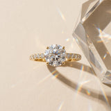 Yellow gold Round Cut Diamond Solitaire Engagement Ring with Pavé Band and Prong Setting_82