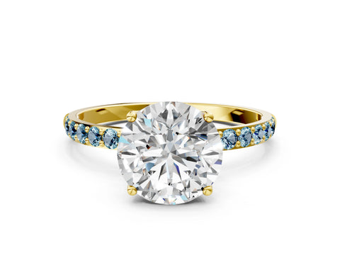 Yellow gold Round Cut Diamond Solitaire Engagement Ring with Round with Aquamarine side stone Pavé Band and Prong Setting