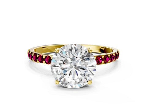 Yellow gold Round Cut Diamond Solitaire Engagement Ring with Round with Garnet side stone Pavé Band and Prong Setting