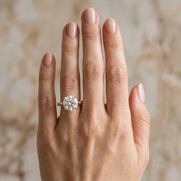 Yellow gold Round Cut Diamond Solitaire Ring with Beaded Band and Prong Setting