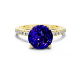 Yellow gold Round Cut Diamond Solitaire Ring with Four-Prong Setting and Pavé Band