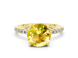 Yellow gold Round Cut Diamond Solitaire Ring with Four-Prong Setting and Pavé Band