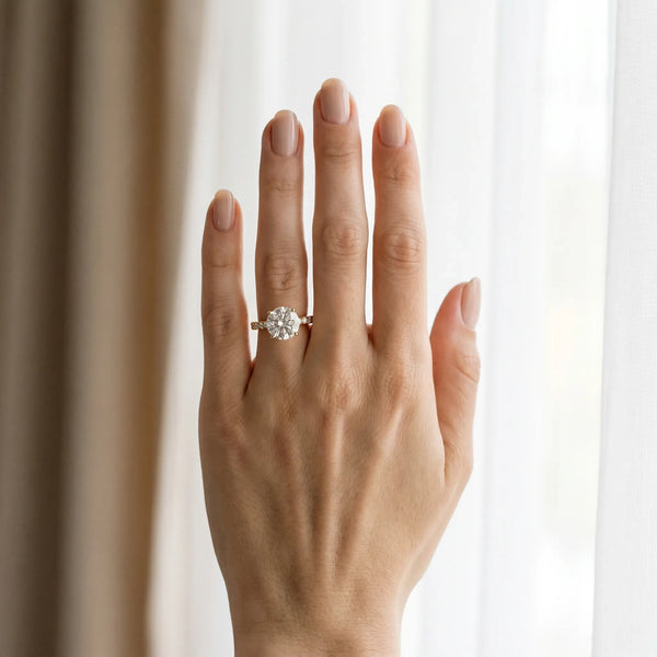 10K Yellow Gold 1.51 Carat E VS1 Round Diamond Solitaire Ring with Round Pavé Band and Four-Prong Setting