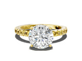 Yellow gold Round Cut Diamond Solitaire Ring with Pavé Band and Four-Prong Setting