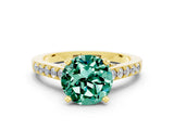Yellow gold Round Cut Diamond Solitaire Ring with Pavé Band and Prong Setting