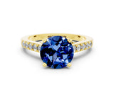 Yellow gold Round Cut Diamond Solitaire Ring with Pavé Band and Prong Setting