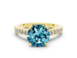 Yellow gold Round Cut Diamond Solitaire Ring with Pavé Band and Prong Setting
