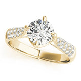 Yellow gold Round Cut Diamond Solitaire Ring with Pavé-Set Shoulders and Four-Prong Setting