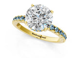 Yellow gold Round Cut Diamond Solitaire Ring with Round with Aquamarine side stone Pavé Band and Four-Prong Setting_37