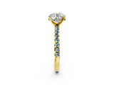 Yellow gold Round Cut Diamond Solitaire Ring with Round with Aquamarine side stone Pavé Band and Four-Prong Setting_38