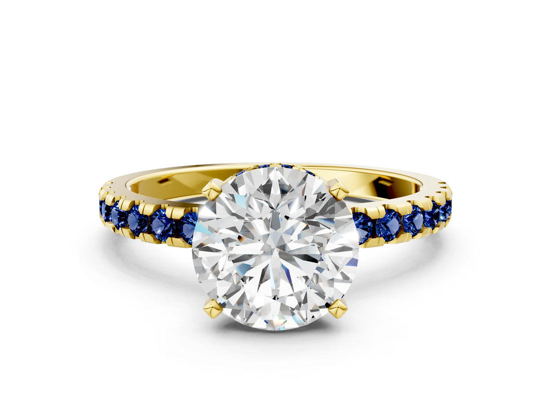 Yellow gold Round Cut Diamond Solitaire Ring with Round with Blue Sapphire side stone Pavé Band and Four-Prong Setting_36