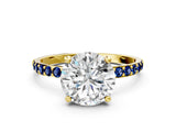 Yellow gold Round Cut Diamond Solitaire Ring with Round with Blue Sapphire side stone Pavé Band and Prong Setting_12