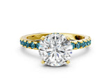 Yellow gold Round Cut Diamond Solitaire Ring with Round with Blue Topaz side stone Pavé Band and Four-Prong Setting_36