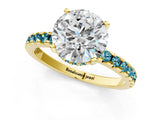 Yellow gold Round Cut Diamond Solitaire Ring with Round with Blue Topaz side stone Pavé Band and Four-Prong Setting_37