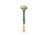 Yellow gold Round Cut Diamond Solitaire Ring with Round with Blue Topaz side stone Pavé Band and Four-Prong Setting_38
