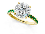 Yellow gold Round Cut Diamond Solitaire Ring with Round with Emerald side stone Pavé Band and Prong Setting_25