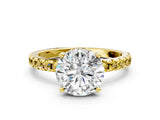 Yellow gold Round Cut Diamond Solitaire Ring with Round with Yellow Sapphire side stone Pavé Band and Four-Prong Setting_36