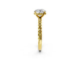 Yellow gold Round Cut Diamond Solitaire Ring with Round with Yellow Sapphire side stone Pavé Band and Four-Prong Setting_38