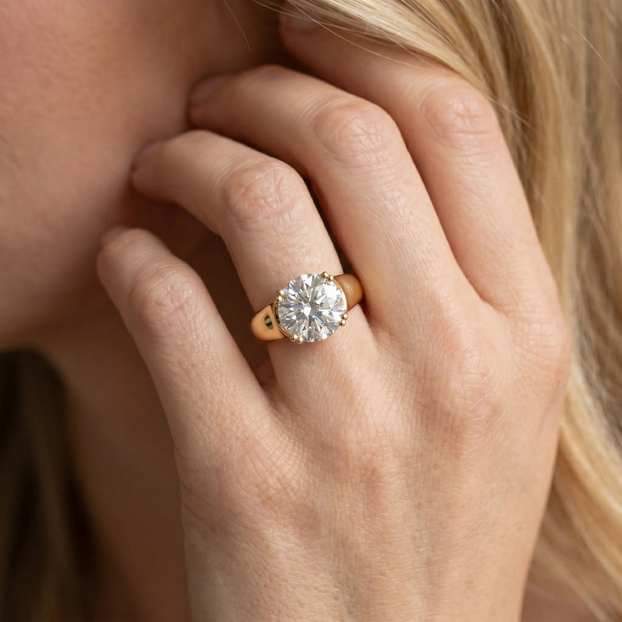 Yellow gold Round Cut Diamond Solitaire Ring with Wide Band and Prong Setting