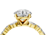 Yellow gold Round Cut Diamond Solitaire with Side Stones on a Pavé Band and Four-Prong Setting_69