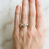 Yellow gold Round Cut Diamond Three-Stone Ring with Channel Set Band and Four-Prong Setting_88