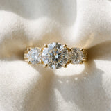 Yellow gold Round Cut Diamond Three-Stone Ring with Channel Set Band and Four-Prong Setting_91