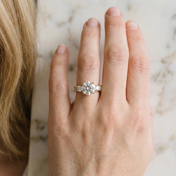Yellow Gold Round Three Stone Engagement Ring Setting with Rimmed Round Sides and Pave Split Shank