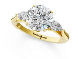 Yellow gold Round Cut Diamond Three-Stone Ring with Pear Side Stones and Four-Prong Setting_93