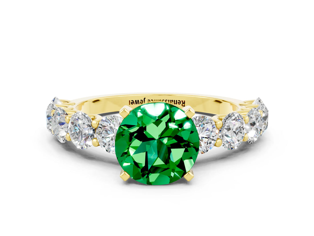 Yellow gold Round Cut Emerald Prong Setting with Side Stones on a Pave Band