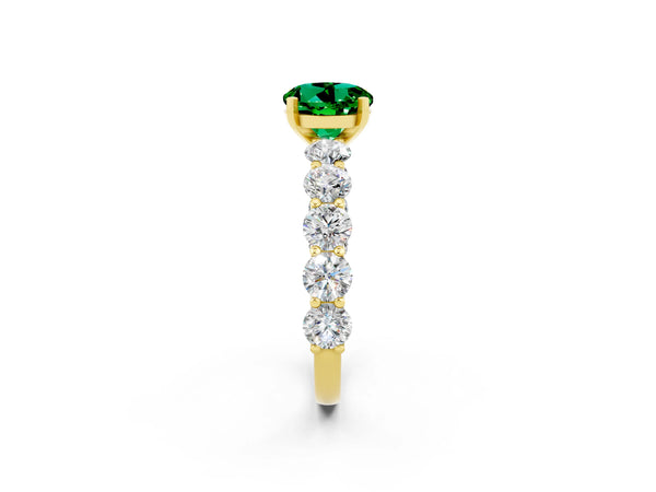 Yellow gold Round Cut Emerald Prong Setting with Side Stones on a Pave Band