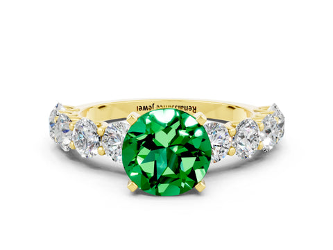 Yellow gold Round Cut Emerald Prong Setting with Side Stones on a Pave Band