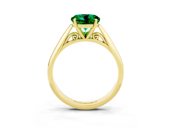 Yellow gold Round Cut Emerald Solitaire Engagement Ring with Cathedral Setting and Four-Prong Mount