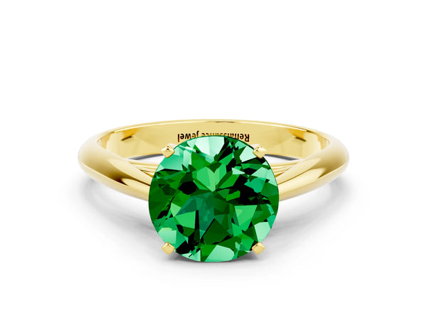 Yellow gold Round Cut Emerald Solitaire Engagement Ring with Cathedral Setting and Four-Prong Mount
