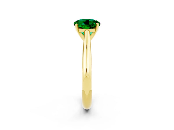 Yellow gold Round Cut Emerald Solitaire Engagement Ring with Cathedral Setting and Four-Prong Mount