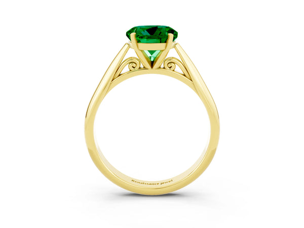 Yellow gold Round Cut Emerald Solitaire Engagement Ring with Cathedral Setting and Four-Prong Mount