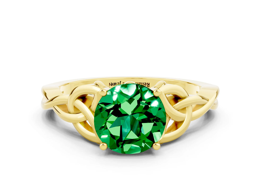 Yellow gold Round Cut Emerald Solitaire Engagement Ring with Celtic Knot Band and Four-Prong Setting