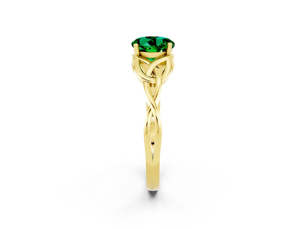 Yellow gold Round Cut Emerald Solitaire Engagement Ring with Celtic Knot Band and Four-Prong Setting