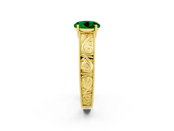 Yellow gold Round Cut Emerald Solitaire Ring with Engraved Band and Four-Prong Setting