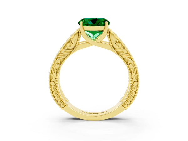 Yellow gold Round Cut Emerald Solitaire Ring with Engraved Band and Four-Prong Setting