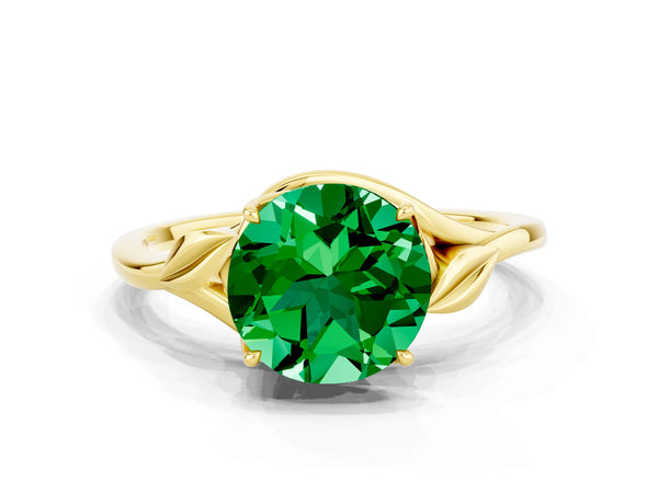 Yellow gold Round Cut Emerald Solitaire Ring with Twist Band and Four-Prong Setting