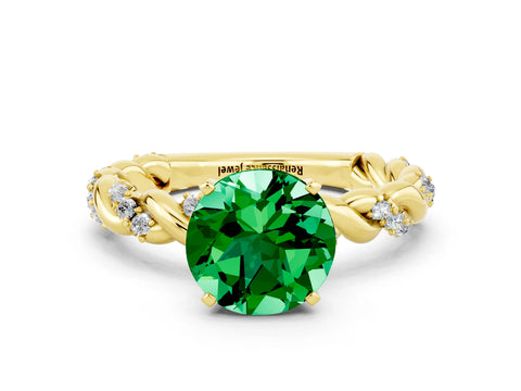 Yellow gold Round Cut Emerald Solitaire Ring with Twisted Band and Pavé Accents