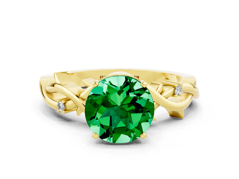 Yellow gold Round Cut Emerald Solitaire Ring with Twisted Band and Prong Setting