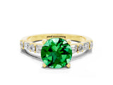 Yellow gold Round Cut Emerald Solitaire with Side Baguettes and Channel Set Band